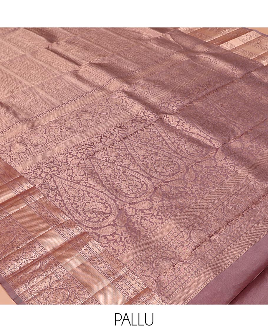 Rosewood Pink Kanchipuram Wedding Silk Saree, Embellished with Jacquard Design on Its Body, Highlighted by Zari Border of Rekku, Muthu, Rudraksham, Mayil Kann, and Kodi Visiry Designs, Grandly Decked up Pallu, and Paired with a Matching Blouse