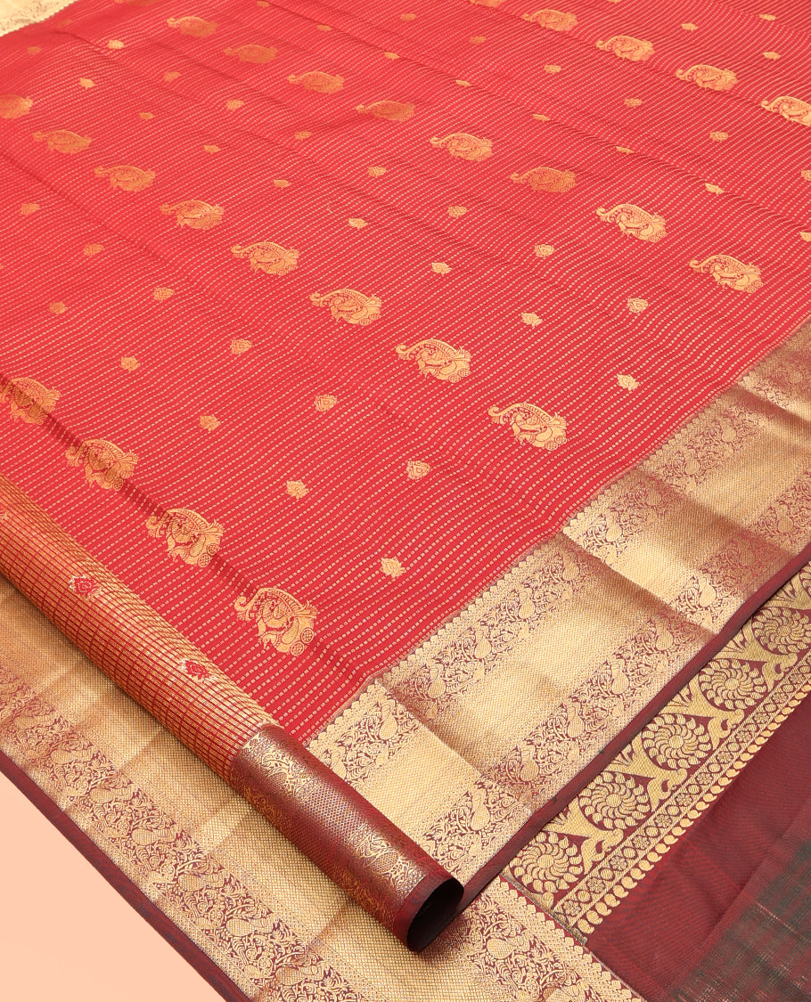 Red Vasundhara Lite Silk Mix Saree, Elevated with Zari Buttas and Muthu Stripes, a Contrast Border of Thilakam Mokku, Ara Maadam, Mayil, and Mayil Kann, Intricate Pallu, and a Contrast Blouse