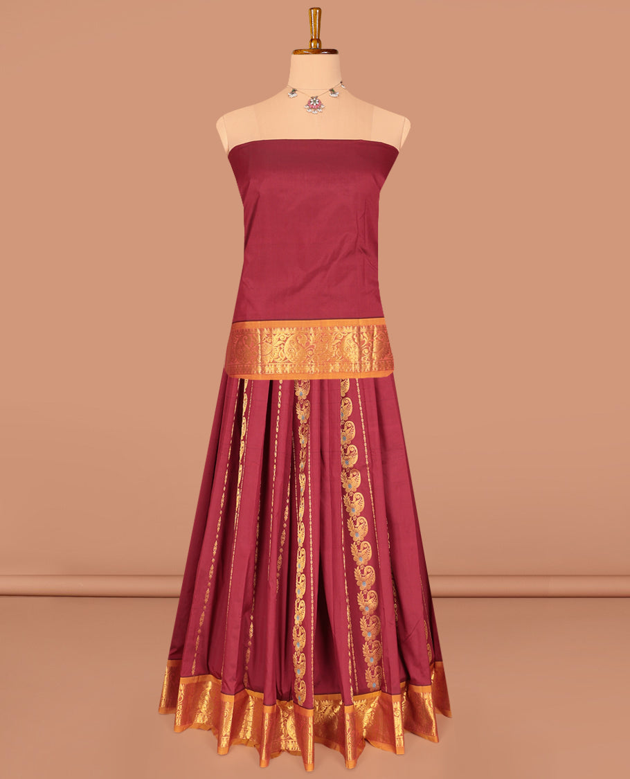 Maroon Art Silk Pavadai Material Set, Adorned with Zari Designs on Its Skirt, Complemented by a Contrast Traditional Zari Border, and a Matching Blouse