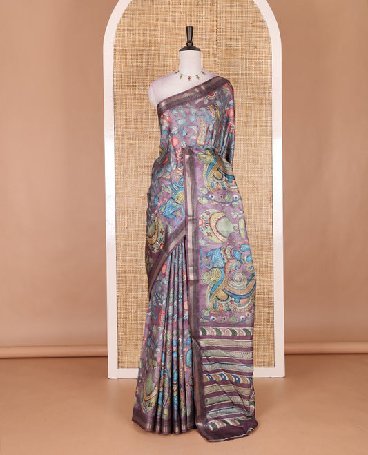 Violet-base multi-color kalamkari floral-vine and peacocks printed semi-tussar saree, gold zari piping border, kalamkari printed pallu, and contrast printed blouse