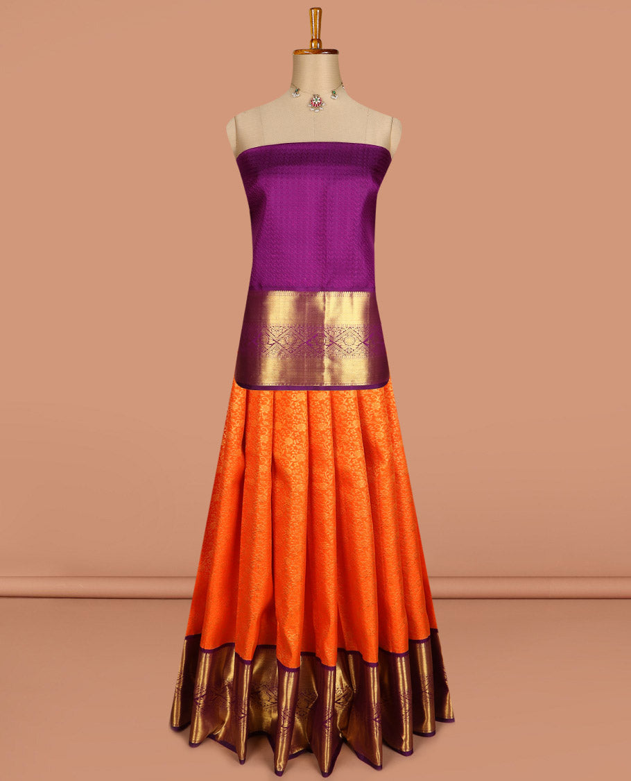 Orange pure silk half saree, jacquard skirt, contrast korvai border of thilakam mokku, paisa, and diamond designs, and jaal dhavani