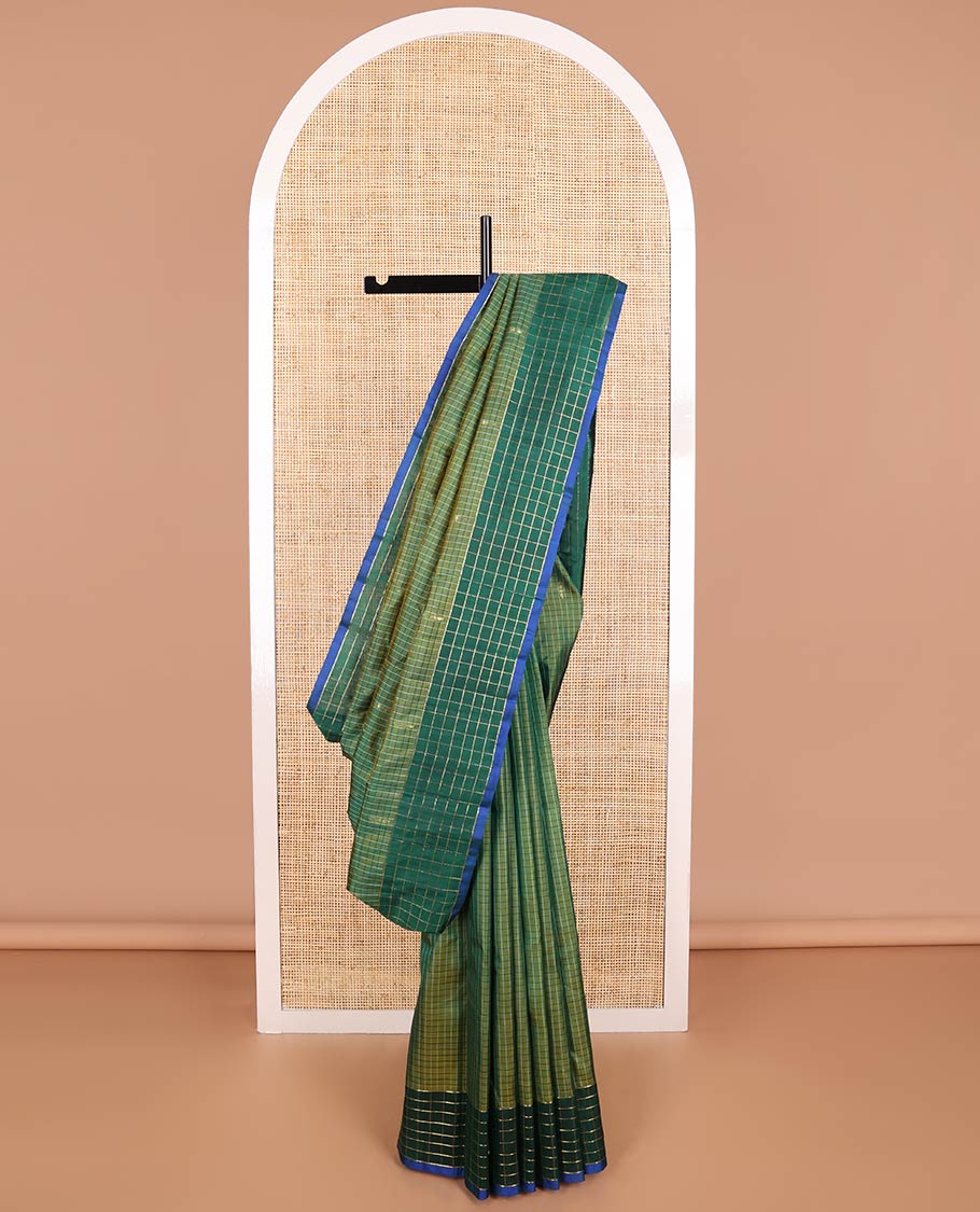 Green checked, buttas kancheepuram silk saree with contrast checked border & striped, floral design pallu