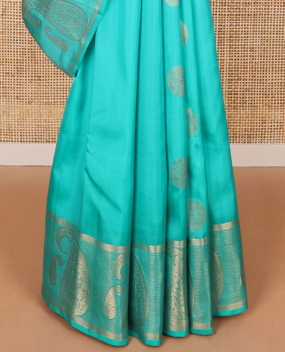 Light blue round buttas vasundhara elite silk saree with self intricate zari design border & floral design pallu