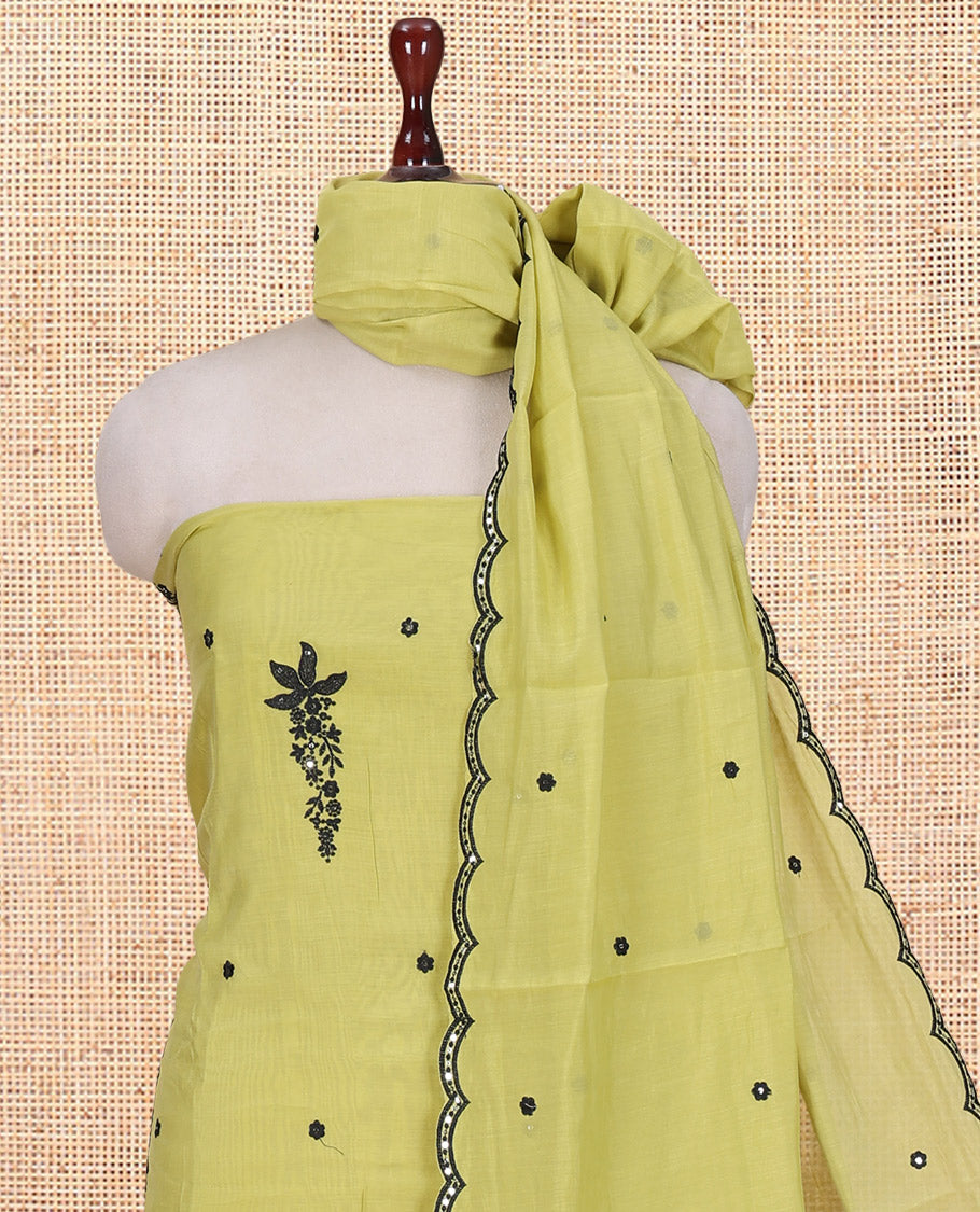 Liril Green-Blue Mul Chanderi Material Churidar Features Floral Embroidered Top, a Matching Bottom, and an Embroidered Scallop Dupatta