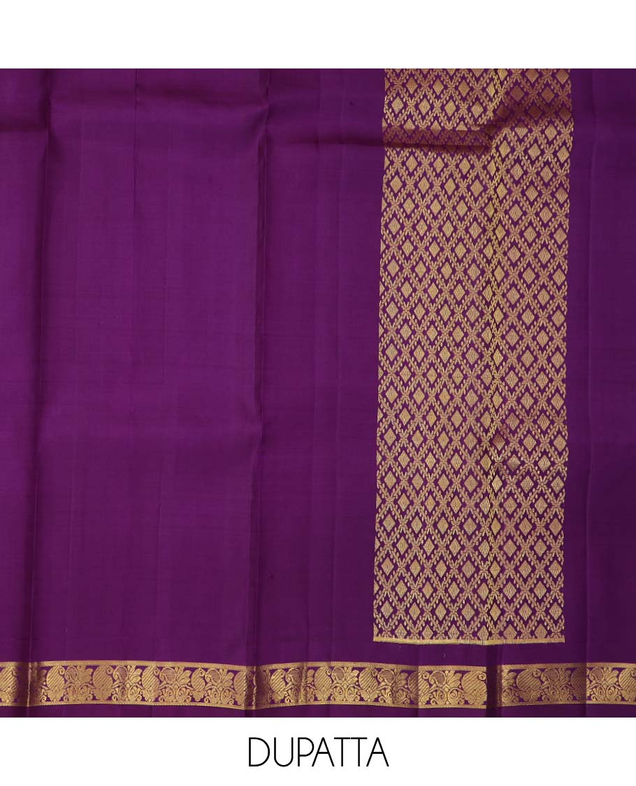 Orange pure silk half saree, jacquard skirt, contrast korvai border of thilakam mokku, paisa, and diamond designs, and jaal dhavani