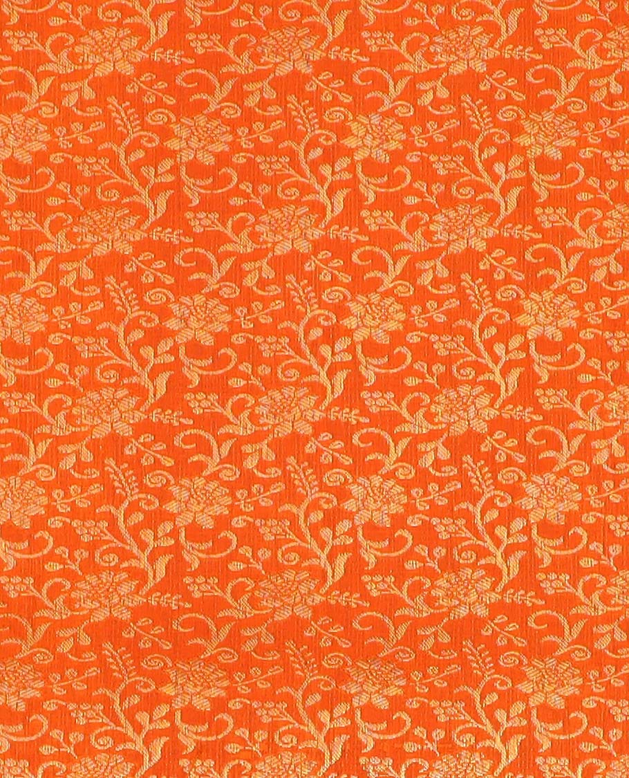 Orange pure silk half saree, jacquard skirt, contrast korvai border of thilakam mokku, paisa, and diamond designs, and jaal dhavani
