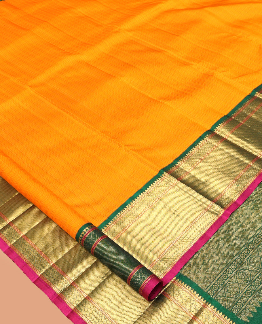 Orange Checked Kanchipuram Silk Saree, Complemented by a Contrast Korvai Border of Rekku, Muthu, Mayil Kann, and Zari Stripes, Grand Jaal Pallu, and a Contrast Blouse