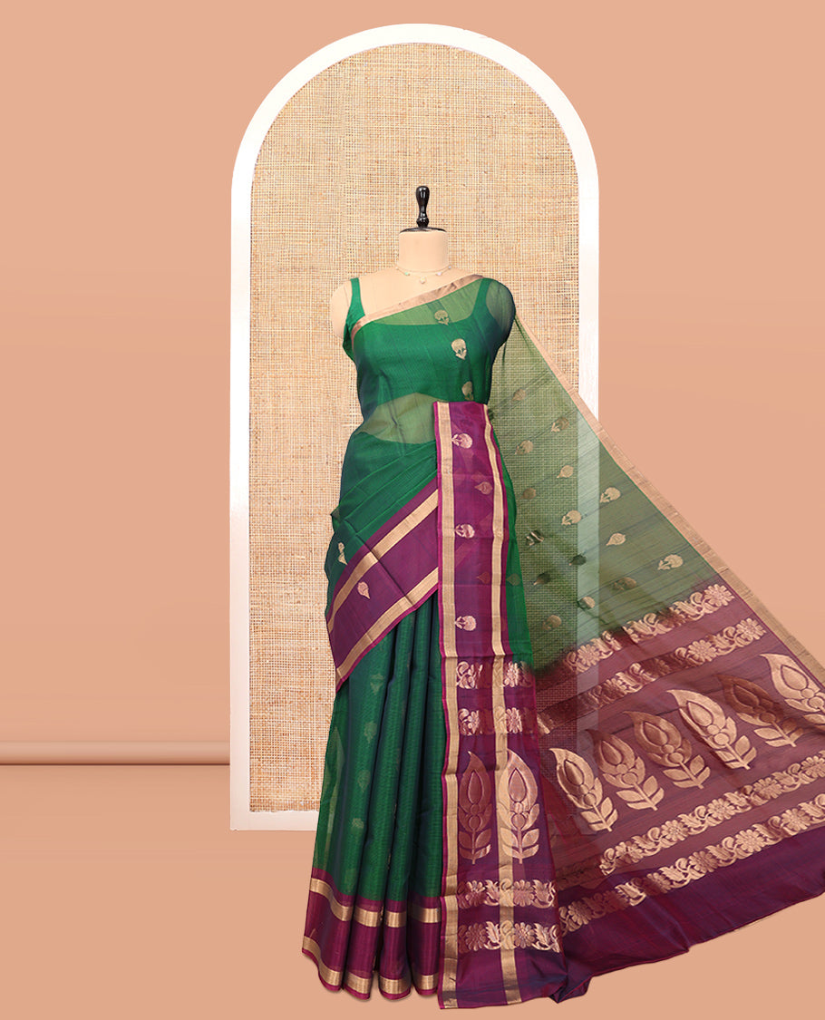 Green Silk Cotton Saree, Crafted with Floral Buttas, a Contrast Floral Motif Border, Intricate Pallu, and a Contrast Blouse