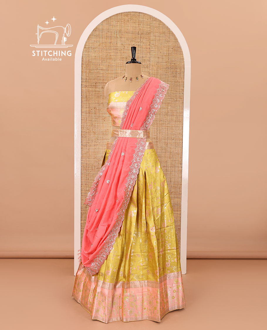 Yellow banarasi half-saree, floral jaal thread weave with contrast floral thread bordered skirt, a matching blouse, and scallop embroidered dhavani with belt