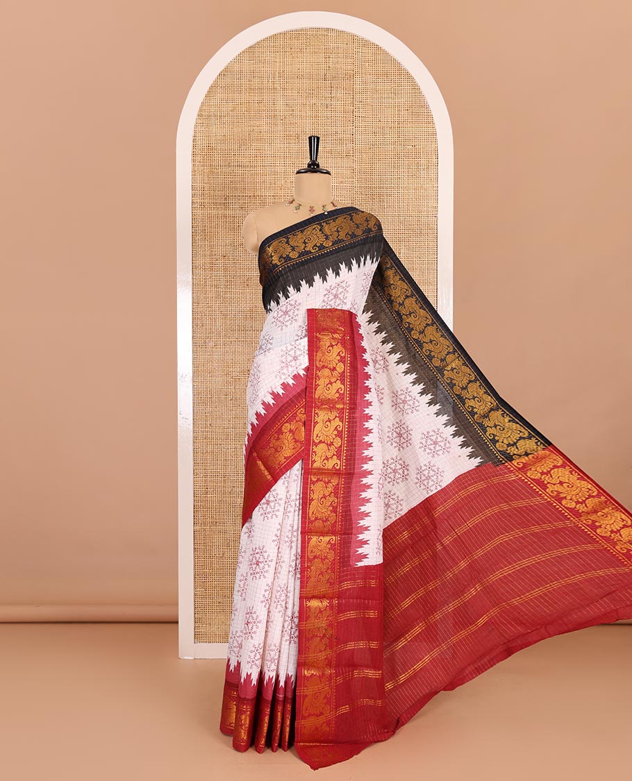 Cream gold zari checked and kolam motifs printed sungudi cotton saree, contrast ganga jamuna temple traditional zari border, zari striped pallu, and a contrast zari checked blouse