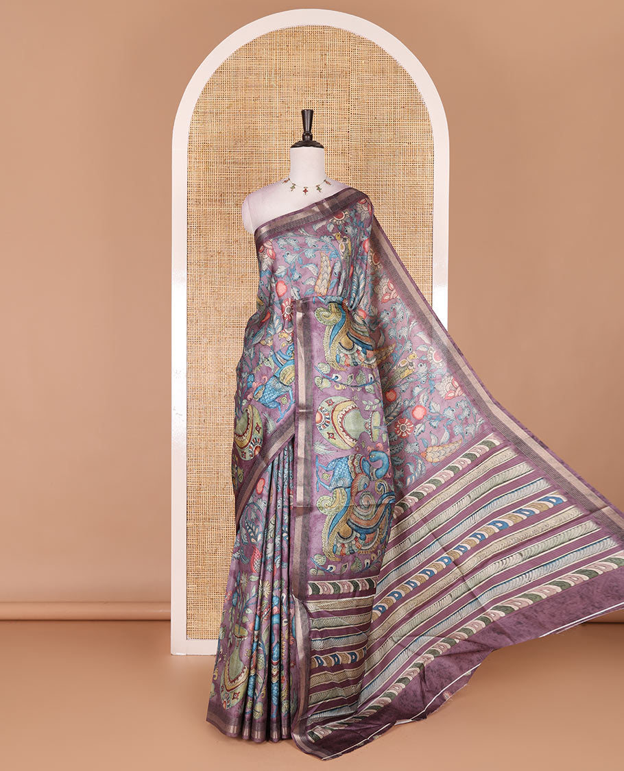Violet-base multi-color kalamkari floral-vine and peacocks printed semi-tussar saree, gold zari piping border, kalamkari printed pallu, and contrast printed blouse