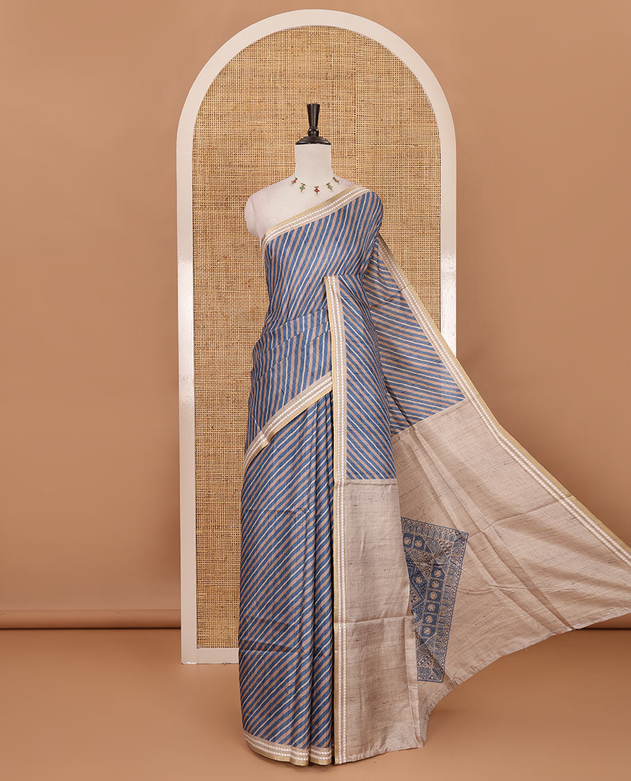 Blue lehariya-style striped semi-tussar saree, contrast resham thread triangle motifs border, diamond printed pallu & contrast printed blouse