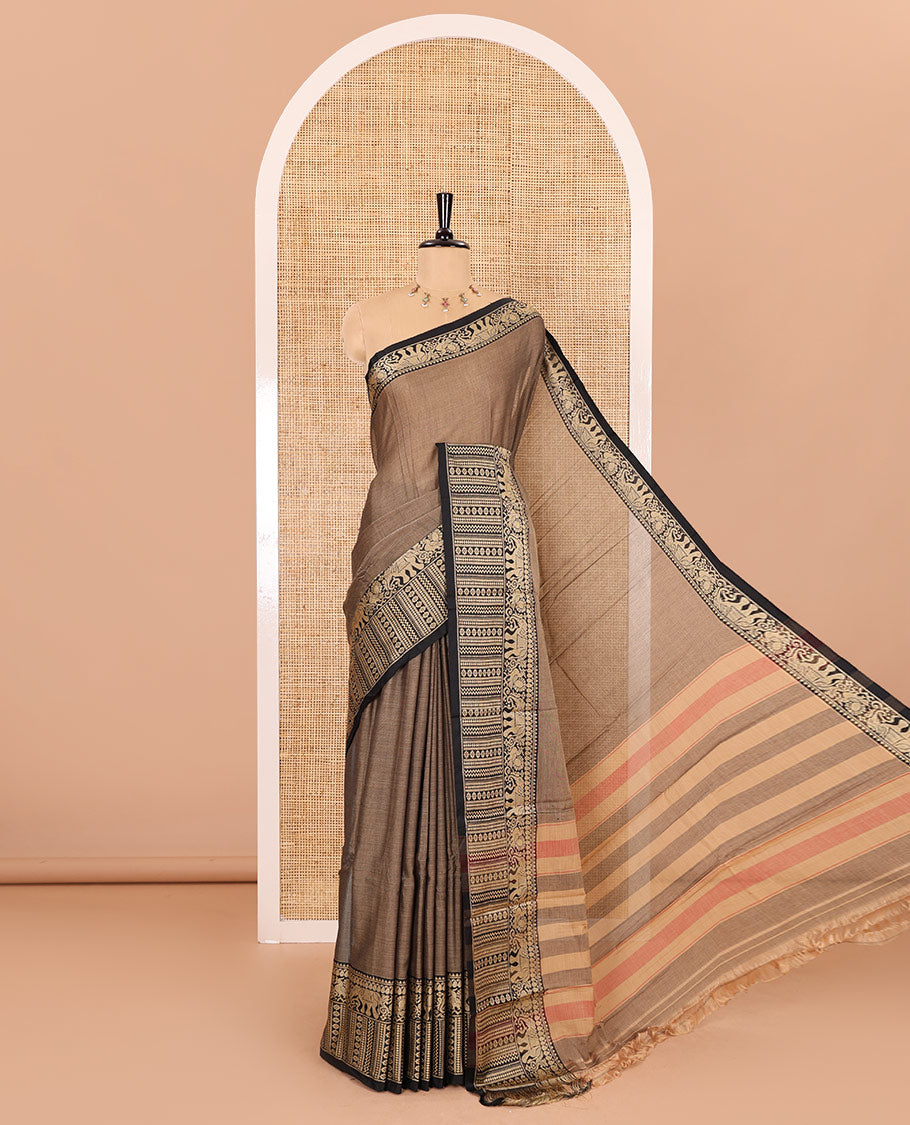 Brown plain mercerised cotton saree, contrast traditional motifs thread woven border, striped pallu, and a matching blouse