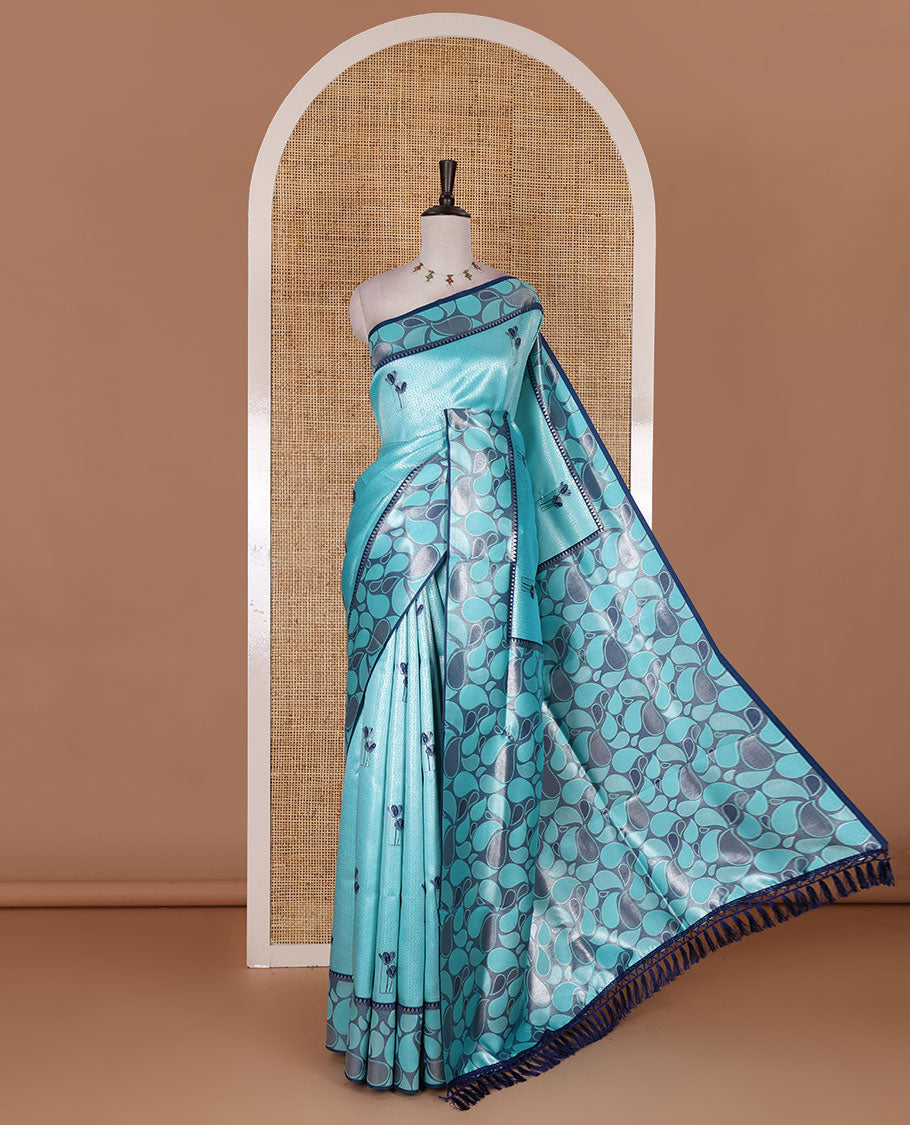 Blue jacquard kanchi silk saree, contrast border, and pallu steeped with paisley motifs with contrast zari design blouse
