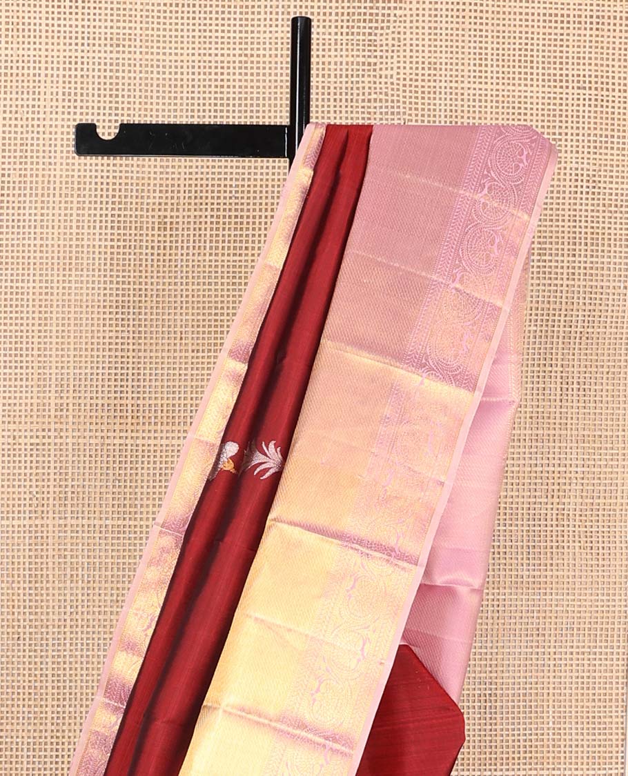 Crimson red floral buttas Kanchipuram korvai silk saree, contrast neer korvai border of thilakam mokku, muthu, kathir, and kodi visiry designs, and zari woven pallu