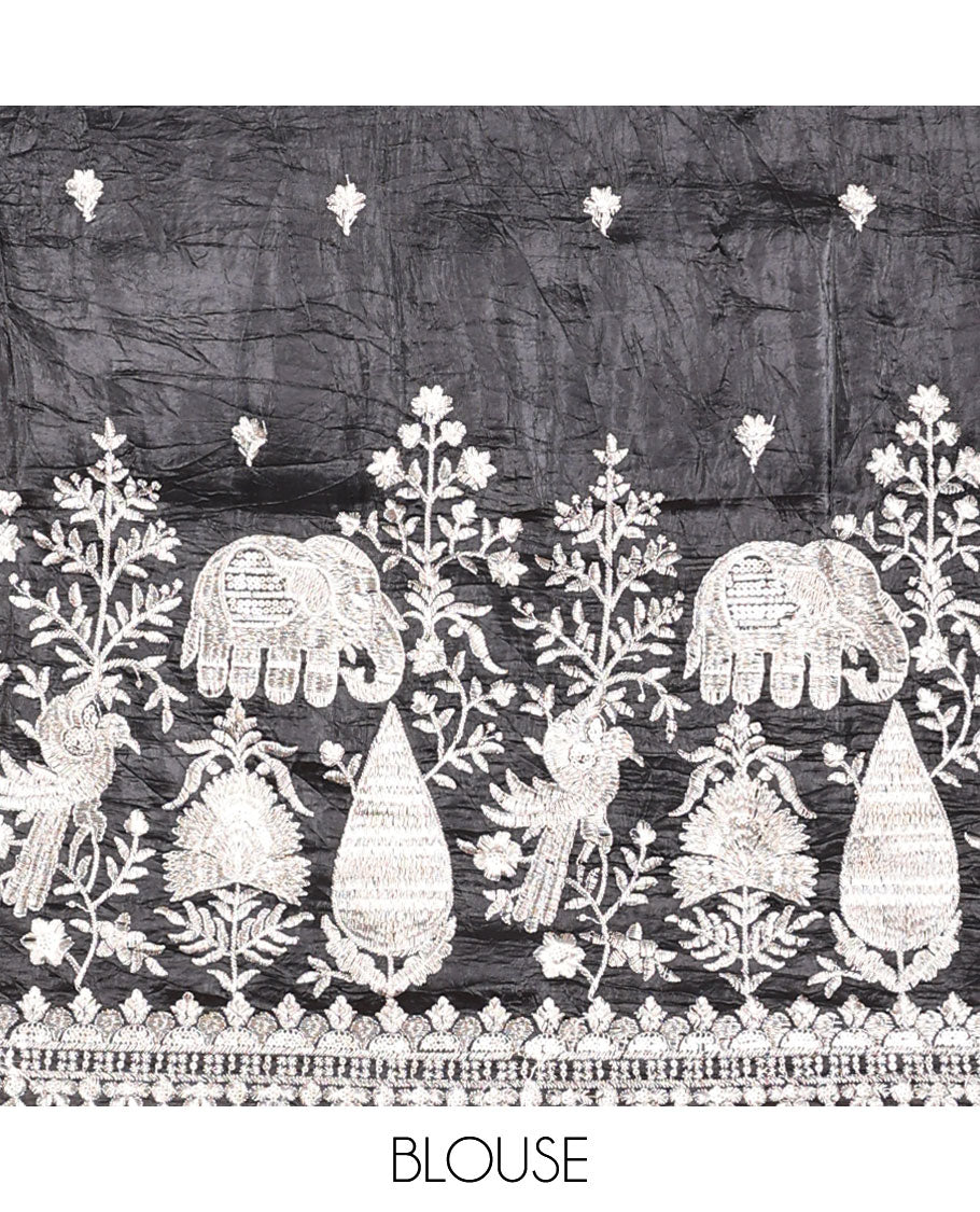 Black floral embroidered half saree with self embroidered border, floral embroidery blouse & floral buttas , scallop border dhavani