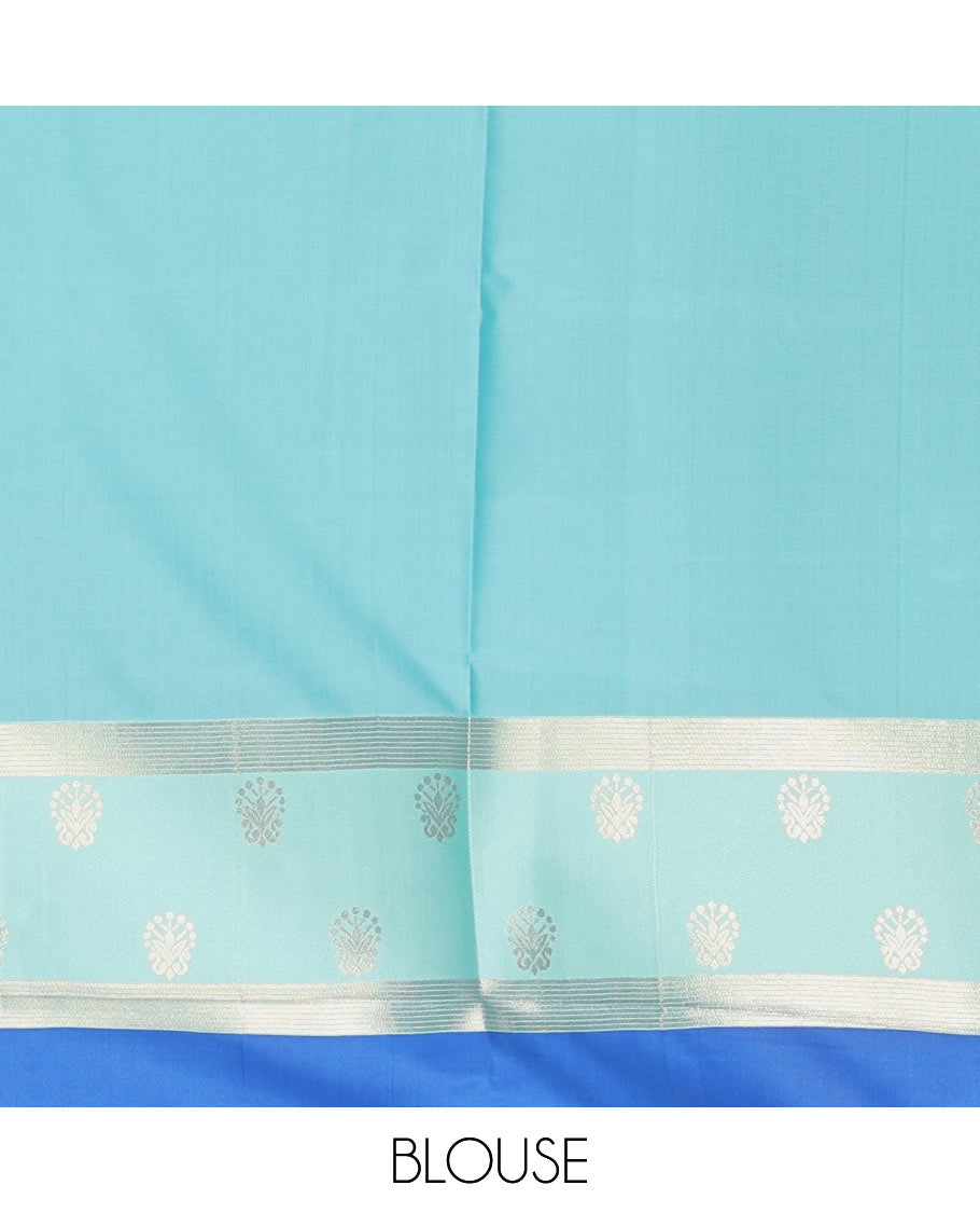 Blue zari buttas soft silk saree, contrast zari border of intricate designs, zari-rich jaal pallu, and a contrast zari design blouse