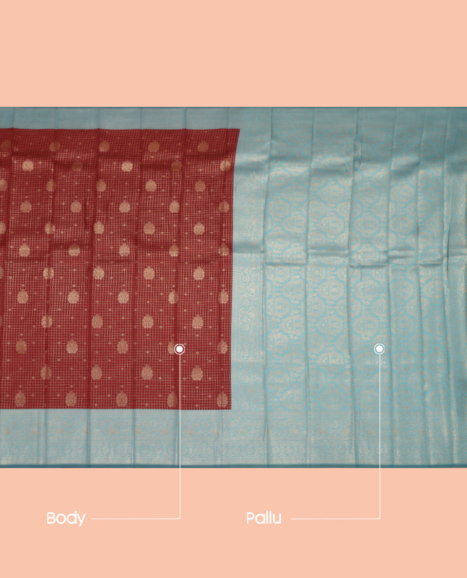 Maroon Litchi Saree, Bedecked with Zari Buttas and Checks, a Contrast Traditional Zari Border, Grand Pallu, and a Contrast Blouse