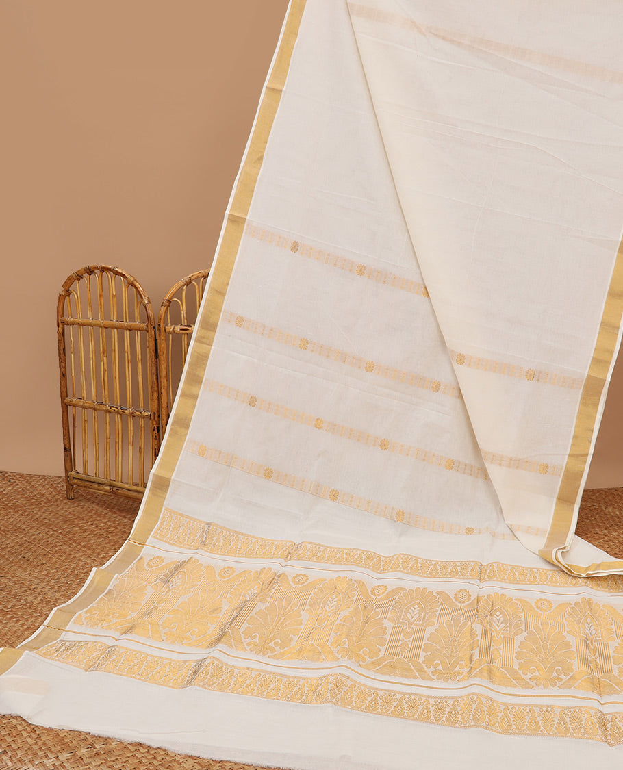 Cream kerala saree with zari designs, plain border & pallu of intricate designs