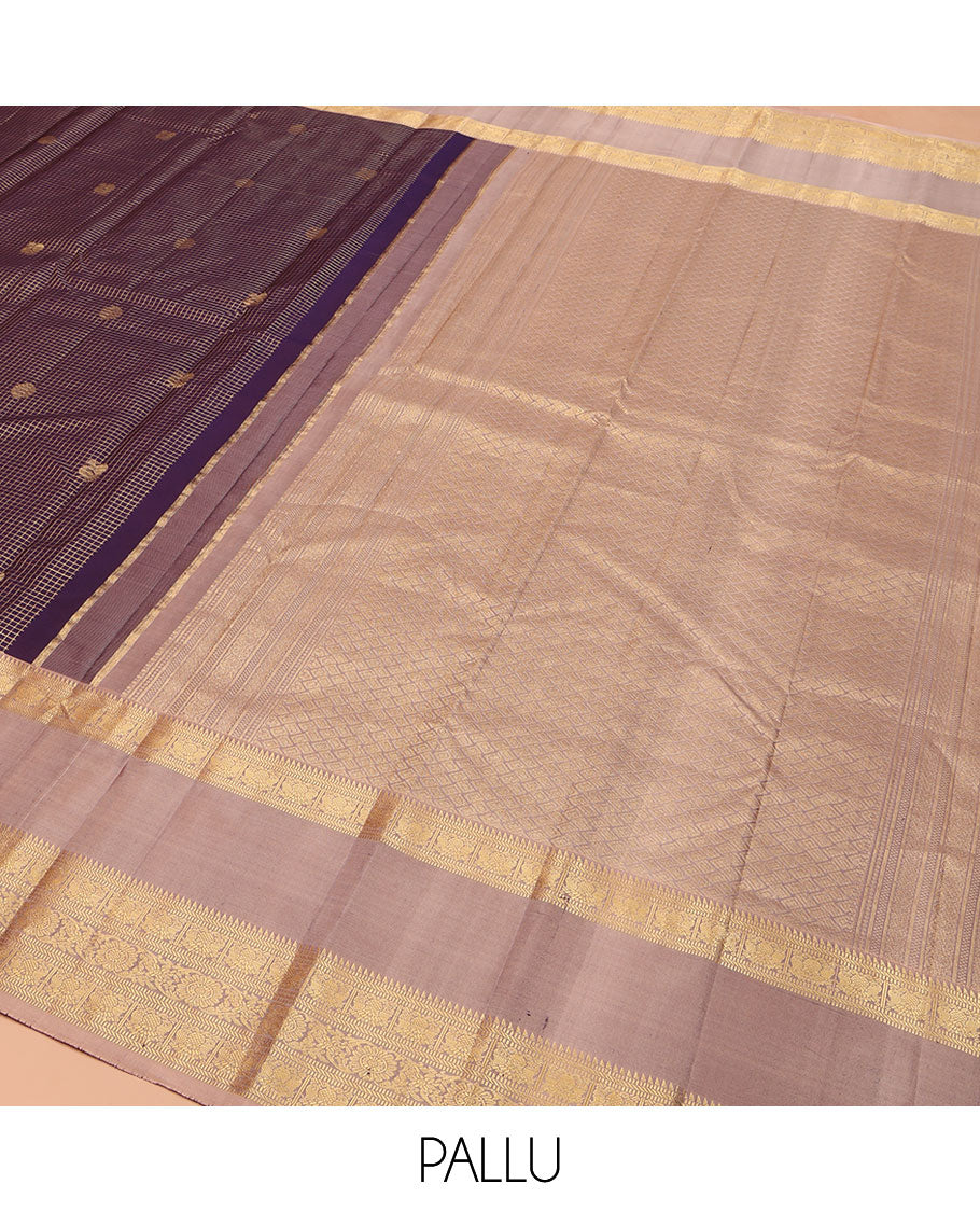 Purple Vasundhara Silk Saree, Steeped in Richness with Mayil-Chakram Buttas and Zari Checks, Complemented by a Contrast Rettai Pettu Border of Ara Bogudi, Muthu, Banaras, Iruthalai Pakshi, and Chakram Designs, Jaal Pallu, and Paired with a Contrast Blouse