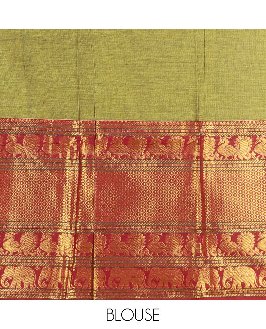 Green half-saree, plain with big contrast traditional zari motifs steeped border skirt, matching blouse and a plain zari border contrast dhavani