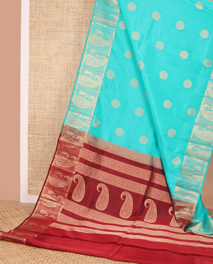 Light blue round buttas vasundhara elite silk saree with self intricate zari design border & floral design pallu