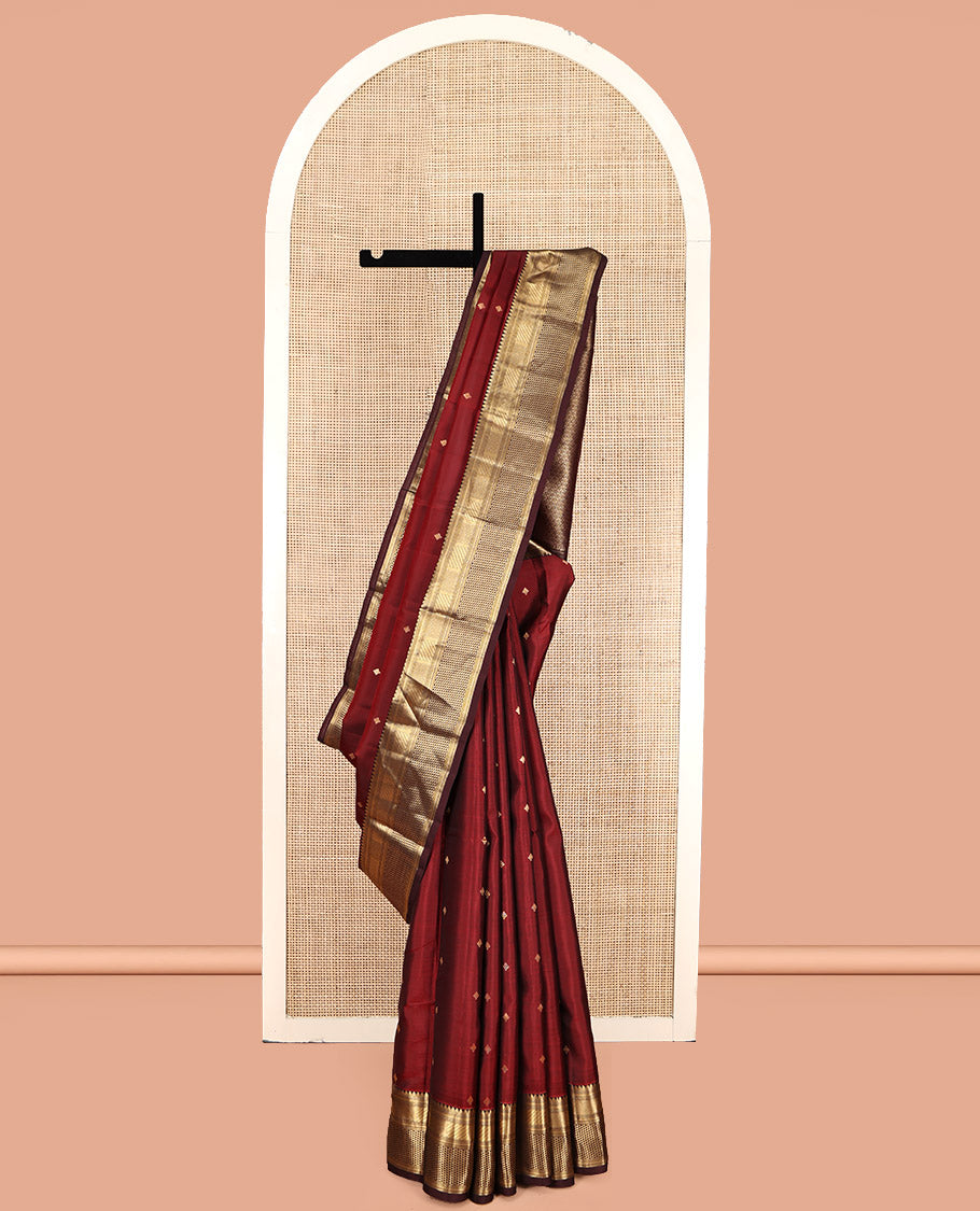 Red Vasundhara Lite Silk Mix Saree, Bedecked with Zari Buttas, a Contrast Border of Thilakam Mokku, Mayil Kann, and Ara Maadam, Grand Pallu, and a Contrast Blouse