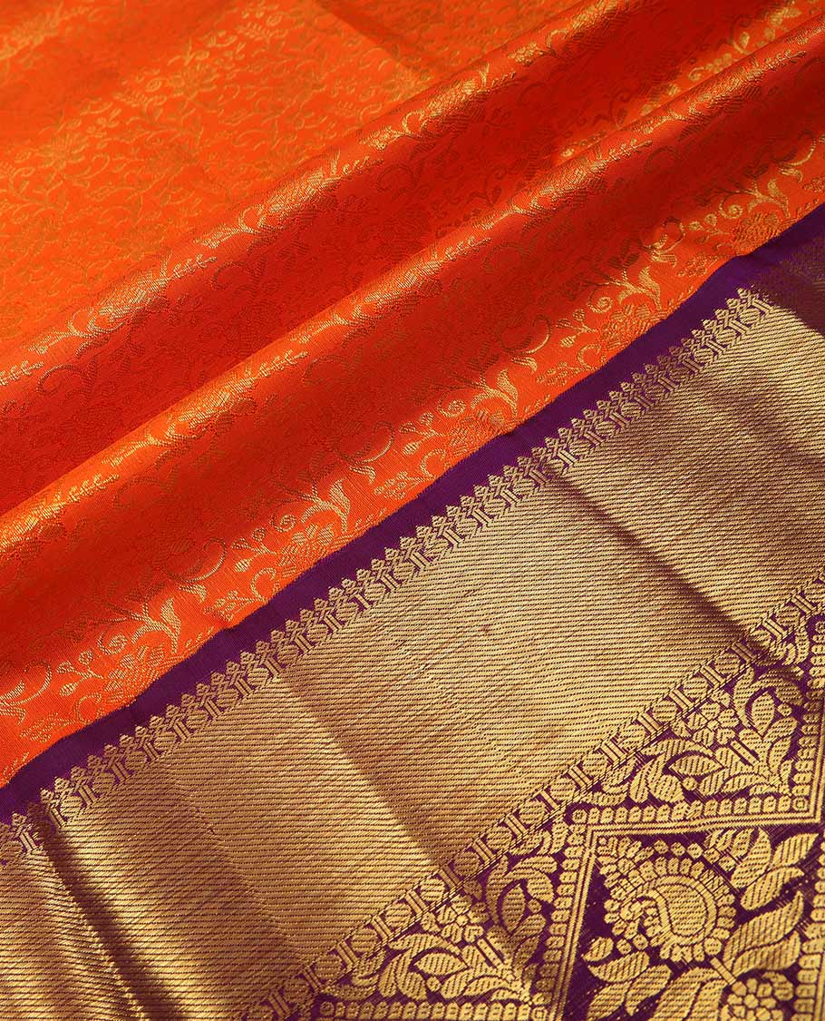 Orange pure silk half saree, jacquard skirt, contrast korvai border of thilakam mokku, paisa, and diamond designs, and jaal dhavani