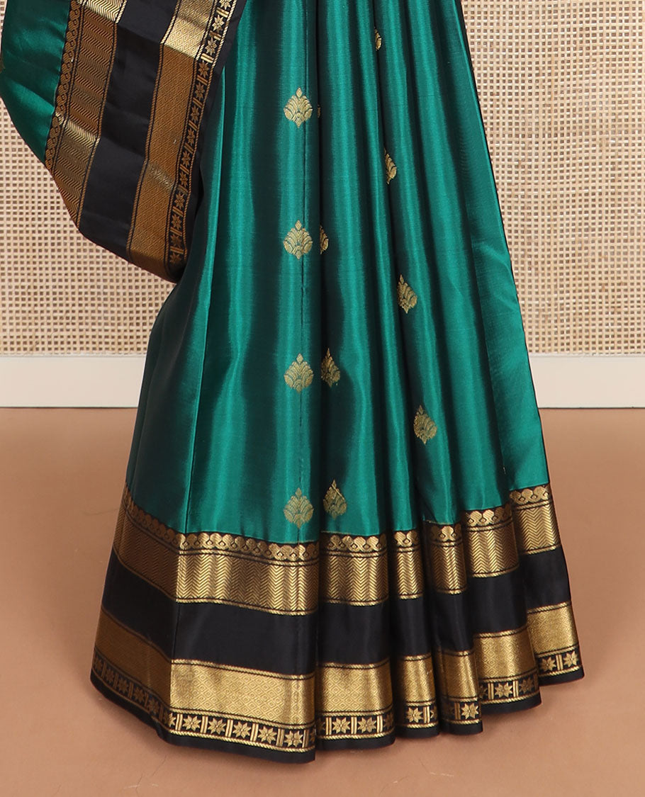 Green zari buttas vasundhara silk mix saree, contrast thilakam motif pallu & rettai pettu border of salngai,vanki,mayil kann & star kamalam