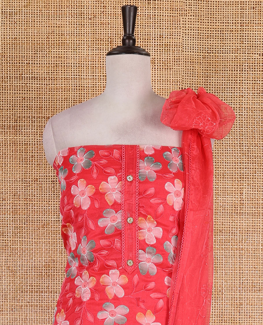 Tomato red churidar material set, floral print with thread outlined organza top, plain santoon bottom, and floral vine sequins embroidered organza dupatta