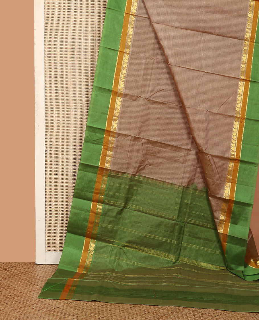 Grey striped Kanchipuram silk saree, contrast rettai pettu border of vanki manga, and kathir designs, and zari striped pallu