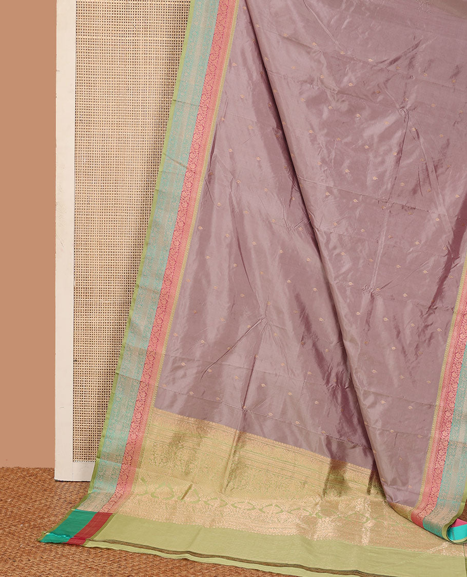 Grey zari buttas katan silk saree, contrast traditional zari border of floral creeper motifs, and Mughal style intricate patterns featured pallu
