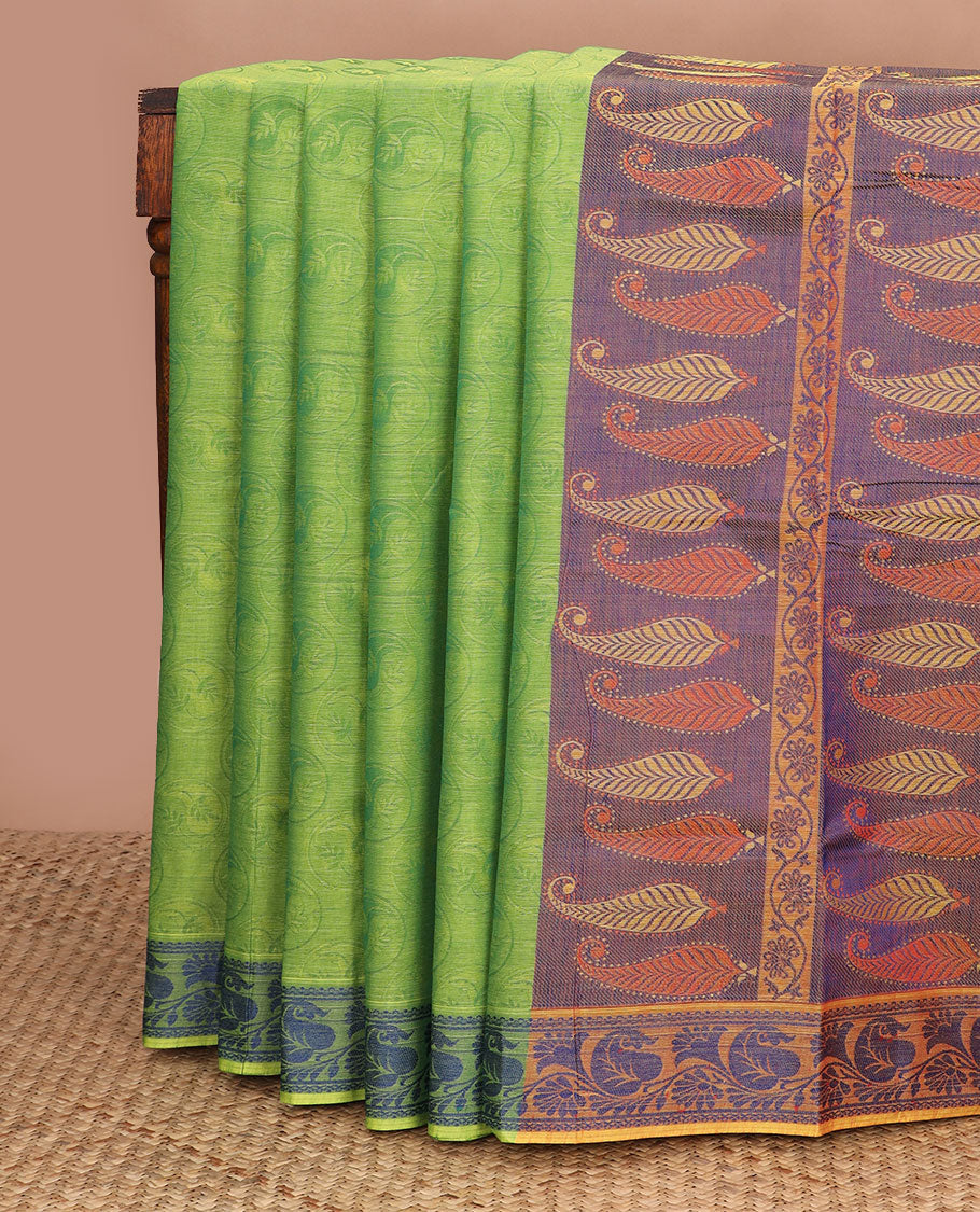Parrot green circular-shaped motifs Coimbatore cotton saree, leaf vine border, & contrast paisley motifs pallu