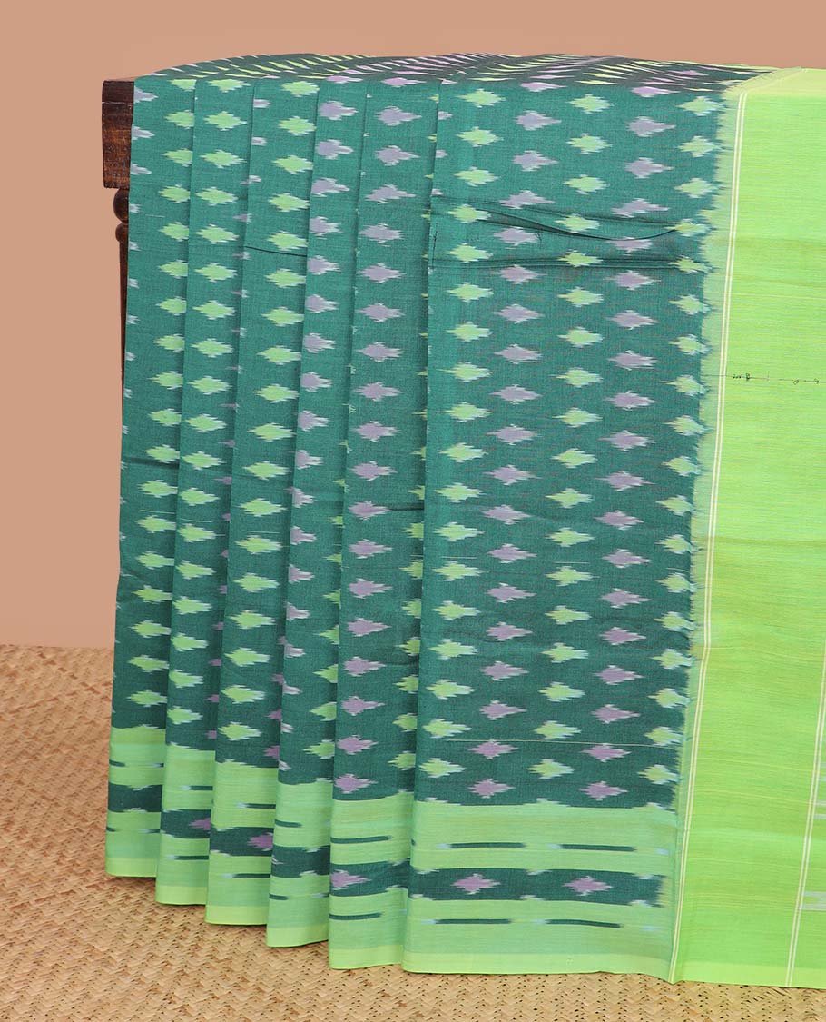 Dark green geometric design ikkat cotton saree with contrast floral border & geometric design pallu