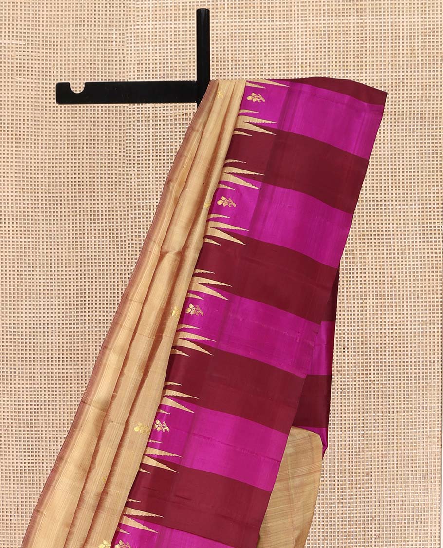 Sandal Kanchipuram Silk Saree, Elevated with Zari Buttas on Its Body, Complemented by a Contrast One-Sided Thazampoo Rekku Border of Zari Buttas, Pallu Steeped with Zari Designs, and Comes Without a Blouse