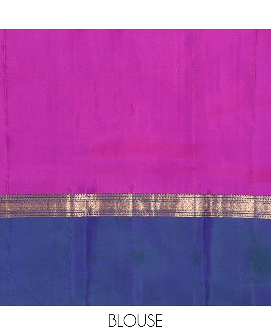 Blue plain Kanchipuram silk saree, contrast ganga jamuna rettai pettu border of rekku, neli, banaras, and rudraksham designs, and pallu of kathir, rudraksham, neli, poun, ara bogudi, and ara maadam