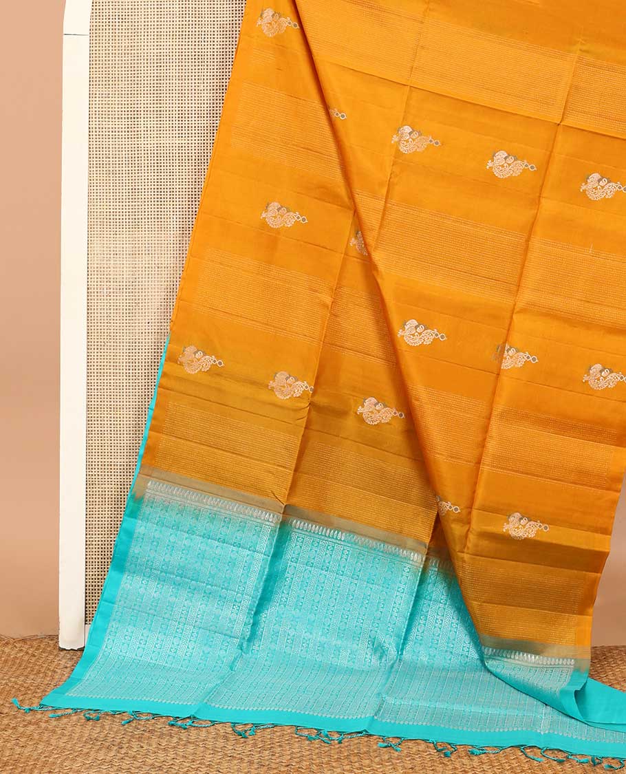 Borderless yellow stripes and mayil buttas soft silk saree, contrast pallu steeped with traditional motifs