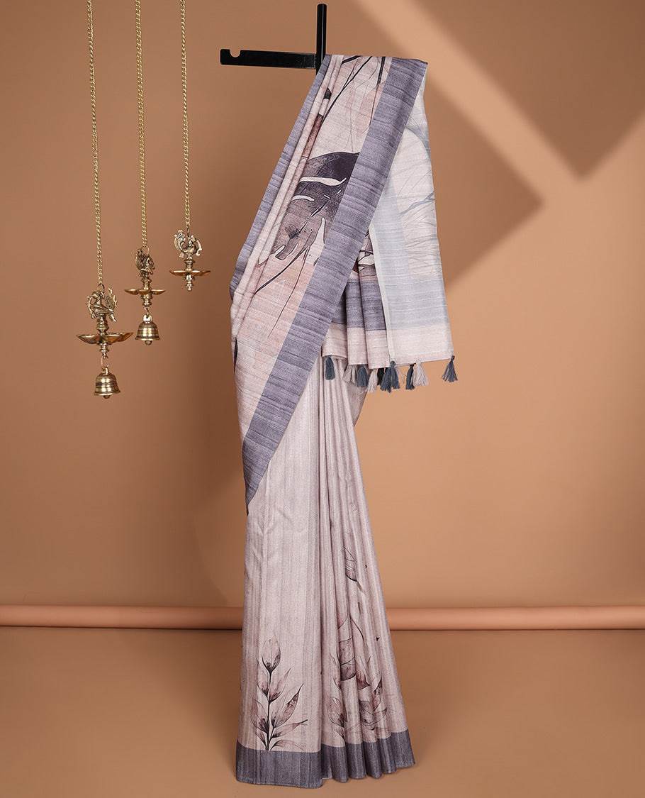 Cream with blue leaf digital printed design semi-tussar saree with contrast border & printed pallu, tussles along with contrast plain blouse