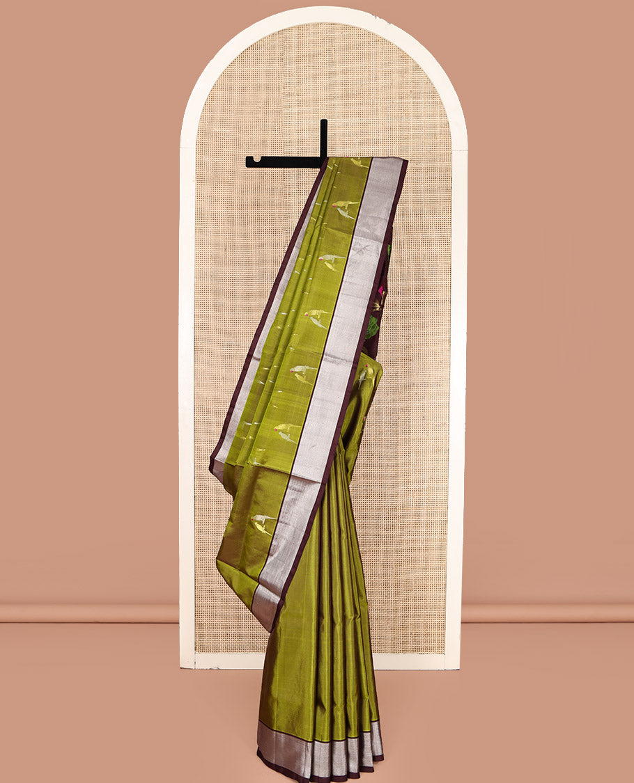 Green Venkatagiri Silk Saree, Mesmerized with Parrot Green All Over Its Body, Complemented by a Contrast Zari Border, Pallu Artfully Detailed with Rose Meenakari Designs, and Paired with a Matching Blouse