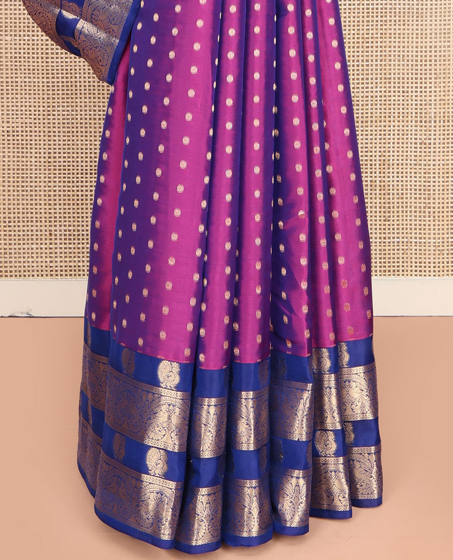 Purple Vasundhara Lite-Silk Mix Saree, Decorated with Buttas All Over Its Body, Complemented by a Contrast Border Steeped with Mayil Designs, Grandly Pallu of Mayil Designs, and Paired with a Contrast Blouse