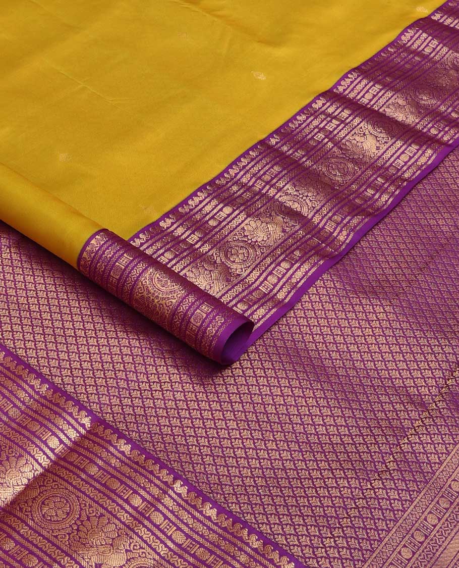Green zari buttas silk saree, contrast border of thilakam manga mokku, rudraksham,cross neli, and annam chakram, and jaal pallu