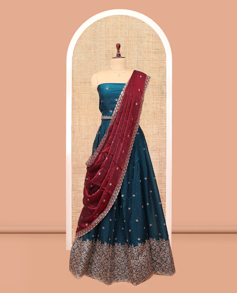 Peacock Blue Banarasi Half-Saree, Impeccably Styled with Embroidered Skirt, a Floral Embroidered Border, a Matching Blouse, and Contrast Scallop Embroidered Dupatta