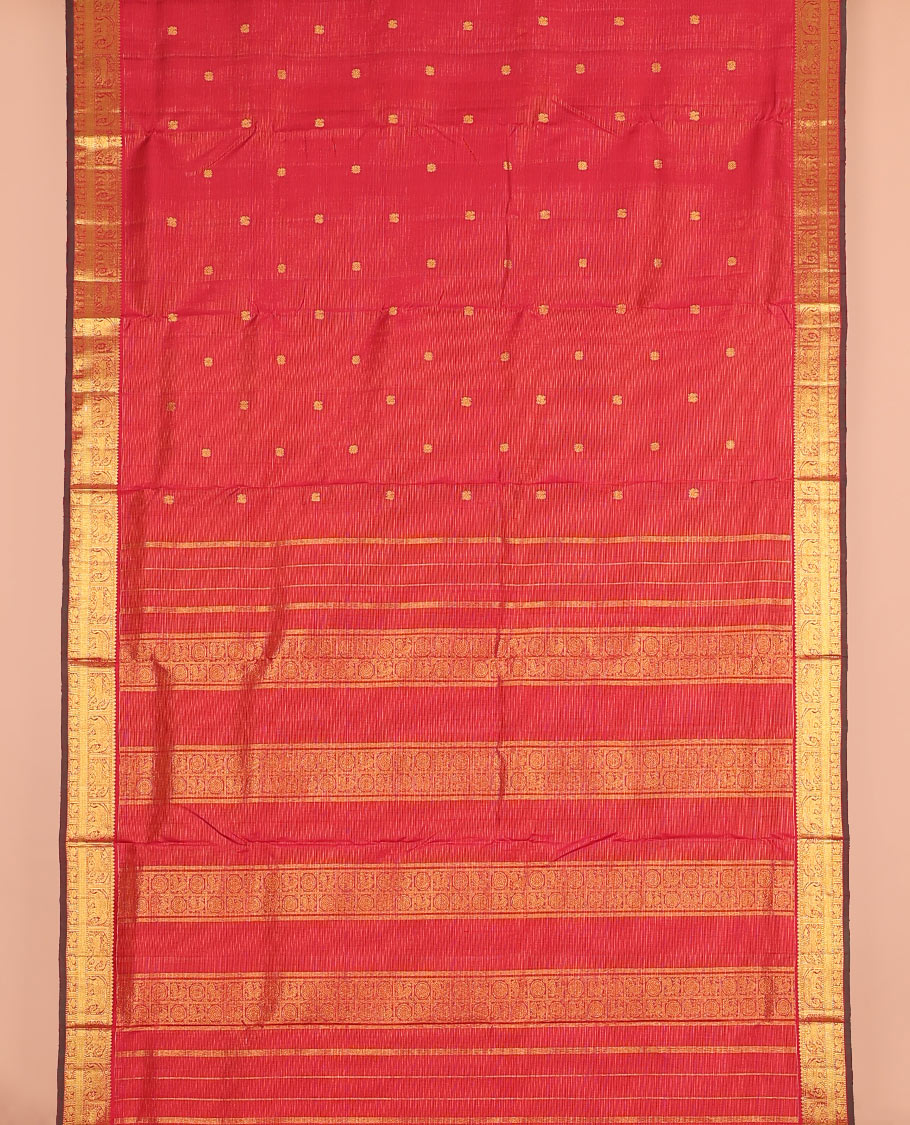 Red zari striped and mayil buttas nine-yard silk saree, zari border of thilakam mokku, muthu, yaanai, yaali, and mayil designs, and zari design pallu