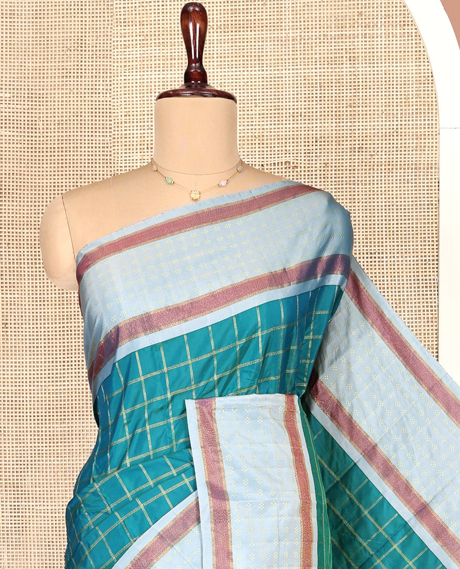 Green Aarani Gift Saree, Mesmerized with Checks on Its Body, Complemented by a Contrast Border, a Pallu of Stripes, and Paired with a Matching Blouse
