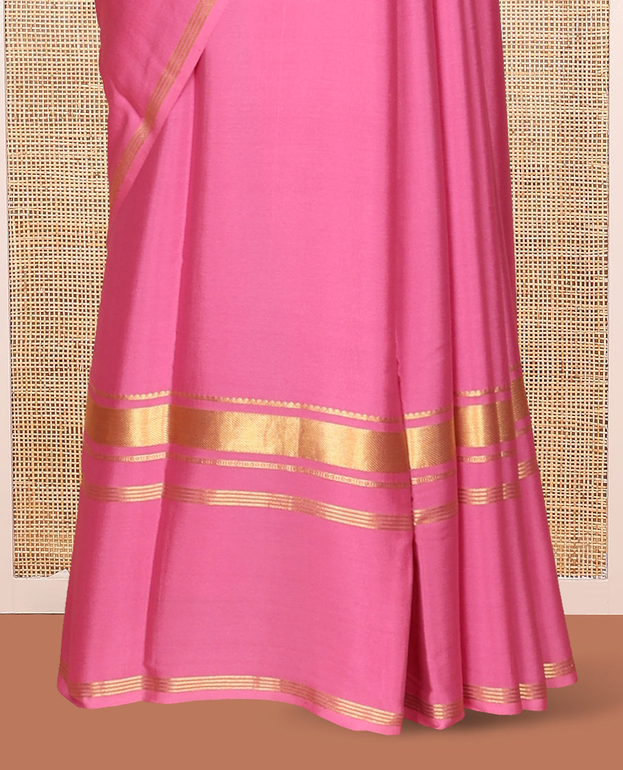 Pink Plain Mysore Silk Saree, Highlighted by Traditional Zari Border of Elephant Motifs, Subtly Zari Striped Pallu, and Paired with a Matching Blouse