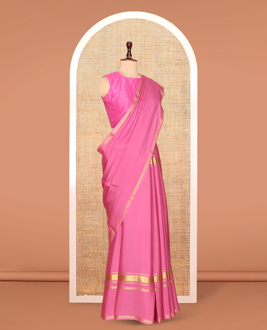 Pink Plain Mysore Silk Saree, Highlighted by Traditional Zari Border of Elephant Motifs, Subtly Zari Striped Pallu, and Paired with a Matching Blouse