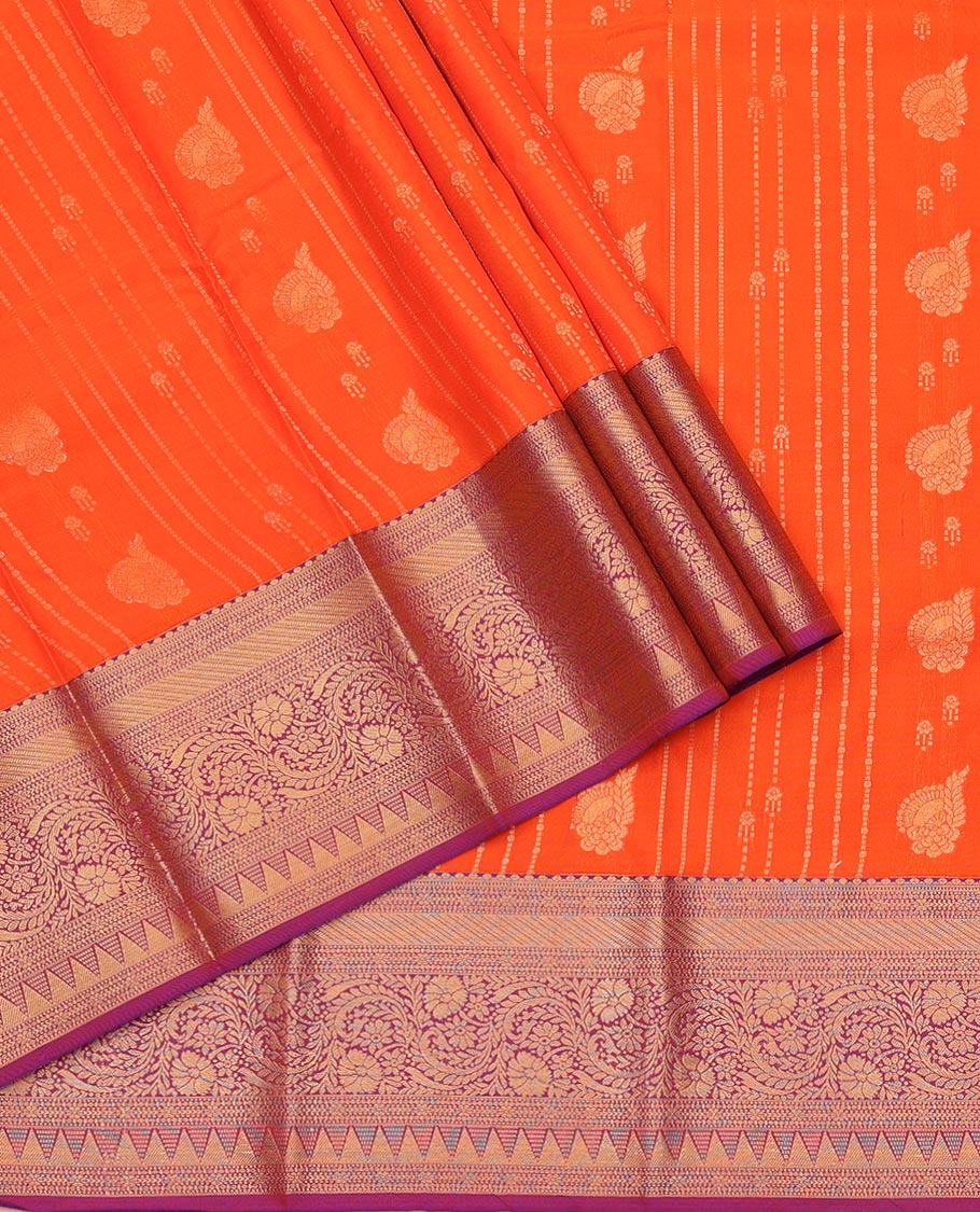Orange Art Silk Pavadai Material Set, Charmingly Accented with Zari Designs on Its Skirt, Complemented by a Contrast Traditional Zari Design Border, and Paired with a Contrast Blouse