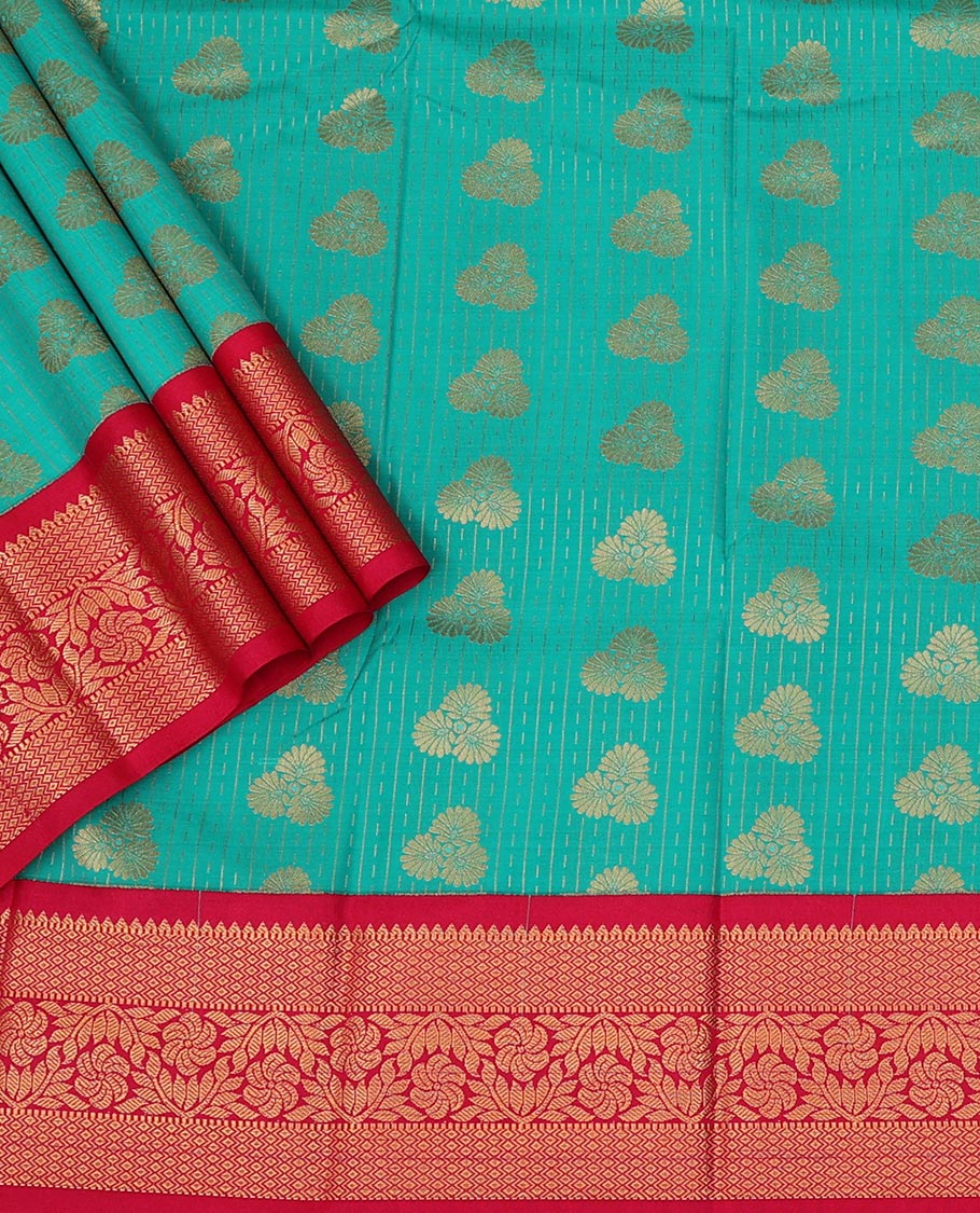 Persian Green Art Silk Pavadai Material Set Featuring Zari Buttas Skirt, Complemented by a Contrast Traditional Zari Design Border, and Paired with a Contrast Blouse