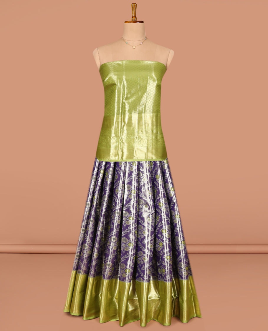Blue Art Silk Pavadai Material Set, Majestically Detailed with Floral Jacquard on Its Skirt, Complemented by a Contrast Traditional Zari Designs Border, and Paired with a Contrast Jacquard Blouse