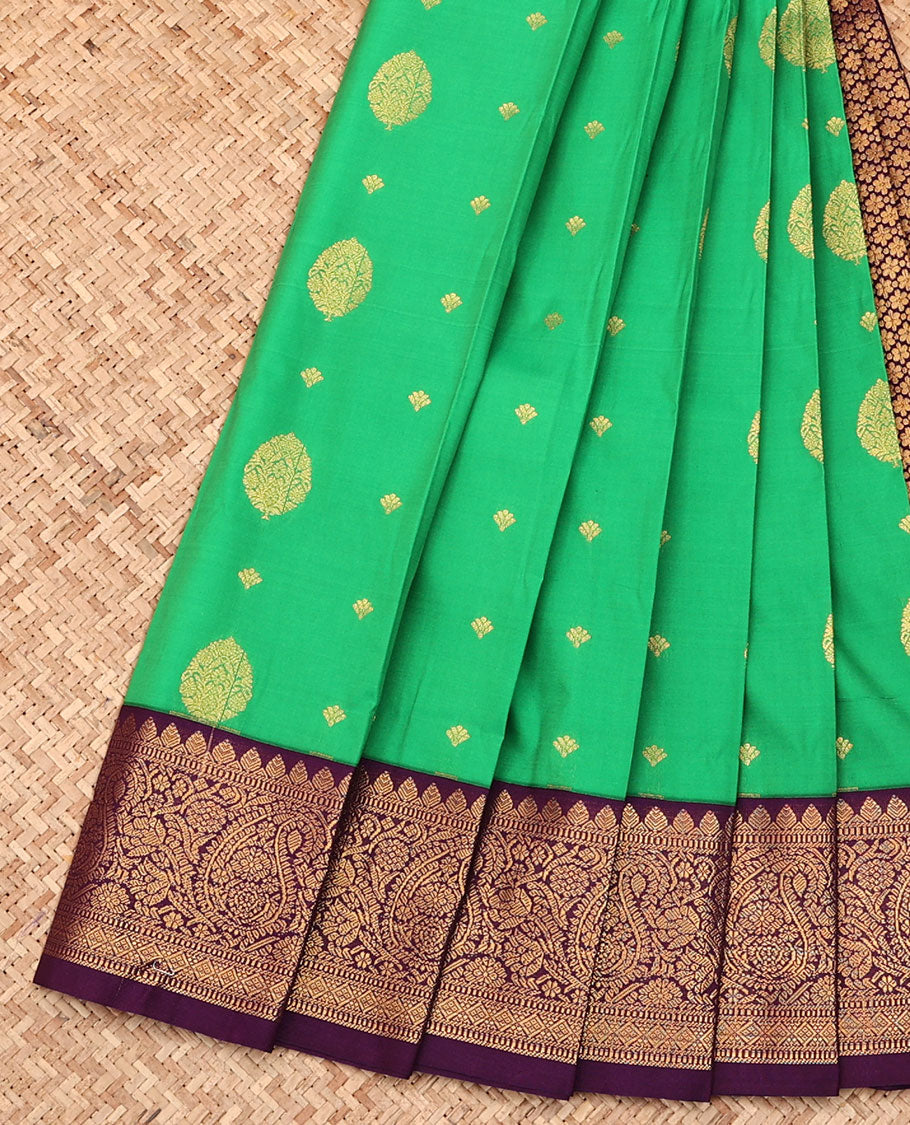 Green Budget Silk Saree, Elevated with Zari Buttas All Over Its Body, Complemented by a Contrast Traditional Zari Border of Paisley Designs, Grand Jaal Pallu, and Paired with a Contrast Blouse